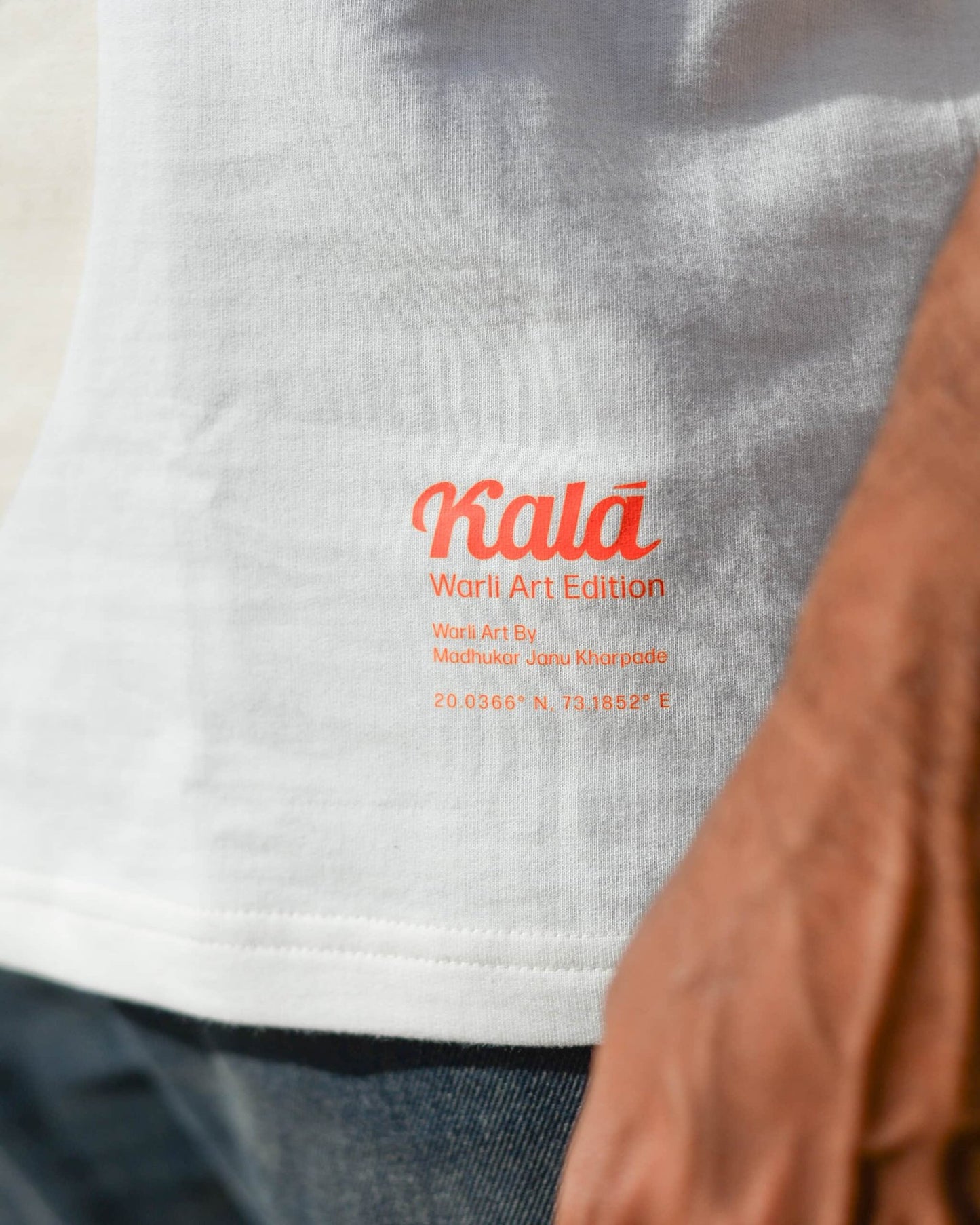 Hand painted Warli art t-shirt. Off-white t-shirt with authentic tribal artwork by Warli artisans.