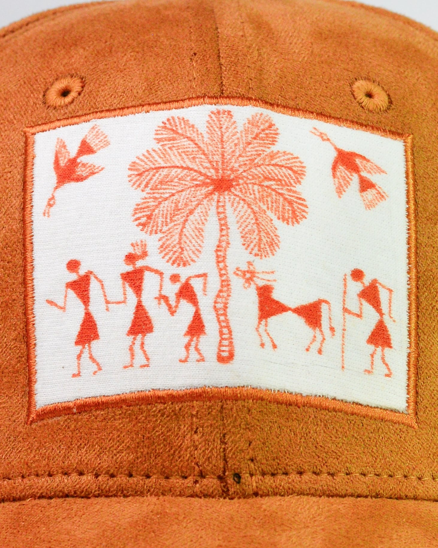 Handmade suede cap with authentic Warli tribal art patchwork.