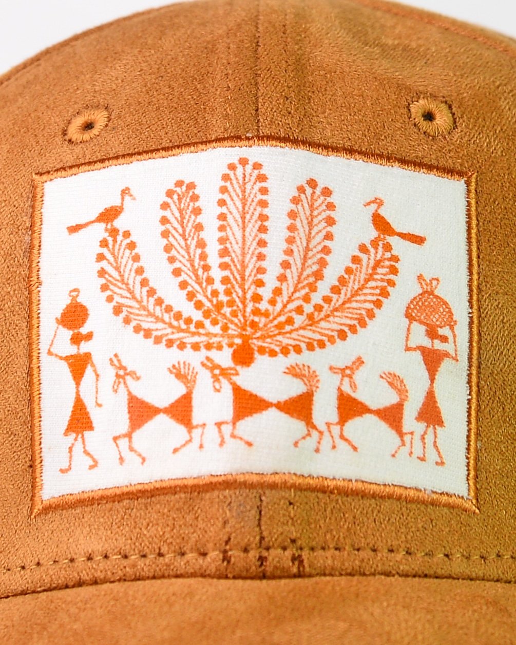 Handmade suede cap with authentic Warli tribal art patchwork.